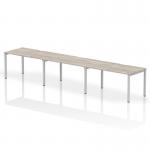 Evolve Plus 1400mm Single Row 3 Person Office Bench Desk Grey Oak Top Silver Frame BE773