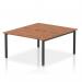 In the photograph, the Dynamic Bench Desking Evolve Plus features a sleek and modern design with a 1400mm B2B 2 person office bench desk. The walnut top complements the black frame, creating a professional and stylish workspace.