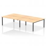 This picture showcases a sleek and modern office setup with the Dynamic Bench Desking Evolve Plus 1600mm B2B desk. The maple top adds warmth, while the black metal frame adds a touch of sophistication. The desk is spacious enough to comfortably fit 4 people, promoting collaboration and productivity.