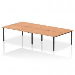 This image shows a modern and stylish office bench desk designed for a team of four. The desk has an oak top and a sturdy black frame, offering a dynamic and versatile work space.