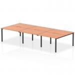 The Dynamic Bench Desking Evolve Plus 1200mm B2B 6 Person Office Bench Desk features a sleek black frame and a stylish beech top. Its dynamic design is perfect for a modern, collaborative office space where 6 people can comfortably work together.