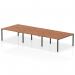 This image features a sleek and modern Dynamic Bench Desking Evolve Plus, measuring 1400mm in length. It is designed for 6 people, with a wide walnut top and a black frame. Perfect for a professional and efficient office space.