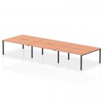 In this photo, you can see a sleek and modern bench desk setup, with a beech top and black frame. The spacious 1600mm length can accommodate up to 6 people, making it perfect for collaborative work or meetings. The dynamic design of this Evolve Plus desk adds a touch of style to any office space.