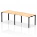 A sleek and modern office setup, this 2-person bench desk features a gorgeous maple top and black frame. Its dynamic design allows for comfortable and efficient work, making it the perfect addition to any workspace. Surrounded by natural light, this desk exudes sophistication and functionality.