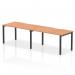 The image shows a sleek and modern office bench desk, measuring 1400mm in length and designed for two people. The desk features a beautiful oak top and a sturdy black frame, exuding a sense of sophistication and style. Its dynamic design allows for a versatile and efficient workspace.