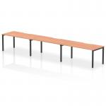 This photograph shows a modern and sleek office bench desk with a single row and space for three people. It features a beech wood top and a black frame, giving it a contemporary and professional look. The desk is part of the Dynamic Bench Desking Evolve Plus range, perfect for creating a collaborative and dynamic workspace.