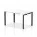 The photograph shows a sleek, modern office desk with a white top and black frame. It is part of a dynamic bench desk starter unit, specifically the Evolve Plus 1200mm single starter, perfect for any professional workspace.