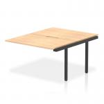 The picture captures a set of add-on units for a dynamic bench desk. It features a sleek maple top with a sturdy black frame, measuring 1200mm in length. These units belong to the Evolve Plus collection and are designed for B2B office spaces.
