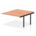The picture shows two sleek, modern bench desk add-on units with a beech top and black frame. The 1400mm size is perfect for an office setting, providing ample space for work or meetings. The dynamic design creates a professional and functional workspace.