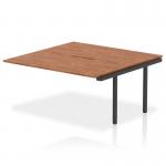 The dynamic bench desk add on units of Evolve Plus measure 1600mm and have a walnut top with a black frame. This set also includes a B2B office bench desk extension kit for added workspace.