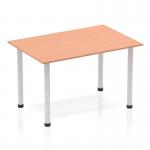 This photograph displays a sleek and modern Dynamic Tables Impulse 1200mm straight table. The Beech top contrasts beautifully with the silver post leg, creating a dynamic and versatile piece for any workspace.
