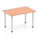 This photograph displays a sleek and modern Dynamic Tables Impulse 1200mm straight table. The Beech top contrasts beautifully with the silver post leg, creating a dynamic and versatile piece for any workspace.