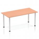 The picture shows a dynamic 1600mm straight table with a beech top and silver post leg. The table has a sleek and modern design, and is perfect for use in any workspace or office setting. Its beech top provides a warm and inviting feel, while the silver post leg adds a touch of sophistication. The dynamic design of the table allows for versatility and flexibility in any environment.