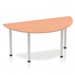 The photo features a sleek, semi-circular beech top table with silver post legs. The dynamic design adds a modern touch to any space, while the 1600mm length provides ample room for group meetings or collaborative work.