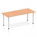 This image shows a sleek and modern Dynamic Tables Impulse 1800mm straight table with an oak top and silver post leg. The table exudes a clean and professional aesthetic, perfect for any office or workspace.