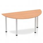 This photo shows a sleek and modern semi-circle table with an oak top and silver post legs. The table is 1600mm in size and exudes a dynamic and stylish vibe.