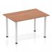 The Dynamic Tables Impulse 1200mm Straight Table features a sleek walnut top and modern silver post legs. Its streamlined design adds a touch of elegance to any space, making it a versatile choice for both home and office environments.