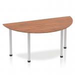 This photo features a sleek and modern semi-circle table, measuring 1600mm. The stunning walnut tabletop provides a dynamic contrast to the silver post leg, creating a sophisticated and stylish look. Perfect for any contemporary workspace or meeting room.