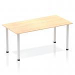 This picture shows a dynamic table with a maple top and silver post legs. The table is 1600mm long and has a straight design. It is sleek and modern, perfect for any office environment.