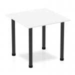 The photo features a modern Dynamic Tables Impulse 800mm square table with a crisp white top and sleek black post leg. The clean lines and minimalist design exude a sense of sophistication and versatility. Perfect for a variety of settings, this table adds a touch of style to any space.