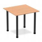 The dynamic table impulse features a sleek 800mm square oak top paired with striking black post legs. This contemporary design adds a touch of modernity to any space while offering ample surface area for various purposes.
