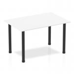 The picture shows a modern Dynamic Tables Impulse 1200mm straight table with a sleek white top and bold black post legs. The table exudes a strong and contemporary look, perfect for any workspace or meeting room.