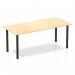The photo shows a sleek and modern Dynamic Tables Impulse 1800mm straight table. The maple top complements the black post legs, adding a stylish touch to any space. Perfect for offices or workspaces, this table exudes elegance and functionality.