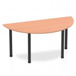 This photograph showcases a sleek Dynamic Tables Impulse 1600mm semi-circle table with a beech wood top and black post legs. The natural wood grain adds warmth to the modern design, while the black legs provide a striking contrast. Perfect for dynamic workspaces, meetings, or events.