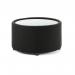 This photograph features a sleek black round coffee table with a glass top, creating a dynamic and modern look. The fabric accents on the table add texture and contrast to the overall design. Perfect for any contemporary living space.