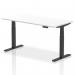 This image shows a sleek and modern Dynamic Sit Stand and Height Adjustable Desk, with a white top and black legs, measuring 1600 x 800mm. The desk can easily be adjusted to different heights, making it highly versatile for any office space.