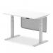This picture shows a sleek and modern Dynamic Sit Stand and Height Adjustable Desk. It features a white top and silver legs, with a silver steel modesty panel for added privacy. The desk is 1200 x 800mm in size and can be easily adjusted to suit different height preferences.