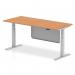 This sleek office desk features a 1800 x 800mm oak top with silver height-adjustable legs and a matching steel modesty panel. The desk has a dynamic sit-stand design, allowing for easy transitions between sitting and standing positions. It also has an air modesty feature, keeping the workplace looking tidy and organized.