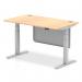 This image depicts a sleek and modern desk, with a maple top and silver legs. It features cable ports for easy organization and a steel modesty panel for privacy. The desk is height adjustable, perfect for both sitting and standing work positions.
