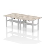 Air Back-to-Back 1200 x 600mm Height Adjustable 4 Person Bench Desk Grey Oak Top with Cable Ports Silver Frame HA01574