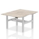Air Back-to-Back 1200 x 800mm Height Adjustable 2 Person Bench Desk Grey Oak Top with Scalloped Edge Silver Frame HA01658