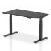 The image shows a sleek and modern Dynamic Sit Stand and Height Adjustable Desk Air in a size of 1400 x 800mm. The desk has a black top with built-in cable ports for convenience and black legs for stability. Perfect for any office setting, this desk offers versatility and style.