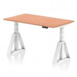 The picture shows a modern and practical office desk, measuring 1400 x 800mm, with a beech top and white legs. The desk is equipped with a dynamic sit stand feature and can also be adjusted to different heights. The unique piste foot adds a touch of style to the overall design.