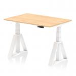The photograph shows a sleek and modern office desk, with a dynamic sit-stand feature. The desk is 1200 x 800mm and has a maple top and white legs. The unique feature is the Piste foot, allowing for easy height adjustments. Ideal for any office space looking for versatility and functionality.