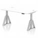 The image features a modern and sleek 1600 x 800mm height adjustable office desk with a white top and silver legs. Cable ports are visible on the surface, and there is a unique piste foot for added stability. The desk can be easily adjusted from a sit to stand position, providing a dynamic and customizable work space.