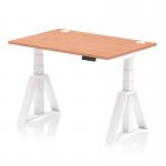This photograph features a stylish and practical office desk, with a beech top and white leg. The desk is 1200 x 800mm in size and is height adjustable, allowing for a dynamic sit-stand option. It also includes cable ports and a piste foot, providing a sleek and organized workspace.