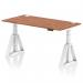 The image shows a sleek and modern office desk with a walnut top and a white height-adjustable leg. The desk is equipped with cable ports for convenience and the unique Piste Foot design. It is spacious and functional, perfect for a dynamic sit-stand work setup.