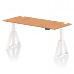 The dynamic sit stand and height adjustable desk features a spacious 1800 x 800mm oak top with cable ports for easy organization. The white legs and piste foot add a touch of modernity to any office space.