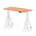 This photograph shows a sleek, modern office desk that can be easily adjusted to different heights and is equipped with cable ports for easy organization. The desk features a beech top and white legs with a unique piste foot design. Perfect for a dynamic, versatile workspace.