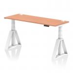 There is a spacious and modern Dynamic Sit Stand and Height Adjustable Desk with a beech top and white legs. It features cable ports and a Piste foot for stability. The desk measures 1600 x 600mm and can be adjusted for comfortable sitting or standing.