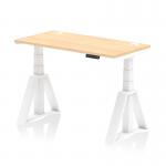 The photograph shows a dynamic sit stand and height adjustable desk, measuring 1200 x 600mm. The desk has a maple top, cable ports, and a white leg with a piste foot. It is a sleek and versatile office desk with modern features.
