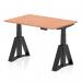 This photograph captures a modern, sleek office desk with a beech top and black leg, adjustable to the perfect height. The dynamic design includes a piste foot for added stability. The desk measures 1200 x 800mm and is perfect for any office space.