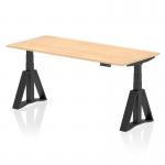 This photo features a dynamic sit stand and height adjustable desk, measuring 1800 x 800mm. The desk has a maple top and black legs, with a piste foot for added stability. The desk is perfect for any office setting, providing flexibility and ergonomic support.