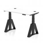 The photo shows a white top office desk measuring 1200 x 600mm with a black adjustable leg attached. There are also cable ports for added convenience and a piste foot for stability. This dynamic sit stand and height adjustable desk is perfect for any modern office space.