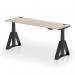 The dynamic sit stand and height adjustable desk is designed to be versatile and ergonomic. The grey oak top complements the sleek black leg with piste foot, creating a modern and functional workspace. With cable ports for seamless organization, this 1800 x 600mm desk provides ample room for productivity.