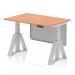 The photograph shows a modern and versatile office desk with a beech top and silver legs. The desk is height adjustable and features a steel modesty panel and piste foot. It exudes a dynamic and professional vibe, perfect for any workplace.